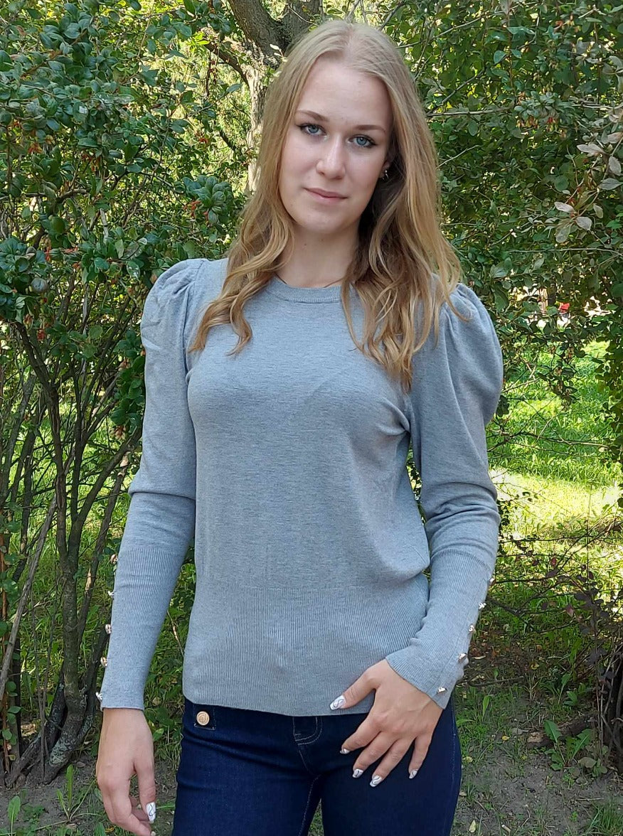 Buggyos ujjú kötött női felső